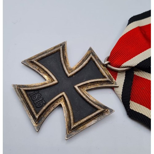 81 - WW2 German Iron Cross 2nd Class EK2. 3 part construction with iron core. In original packet of issue... 