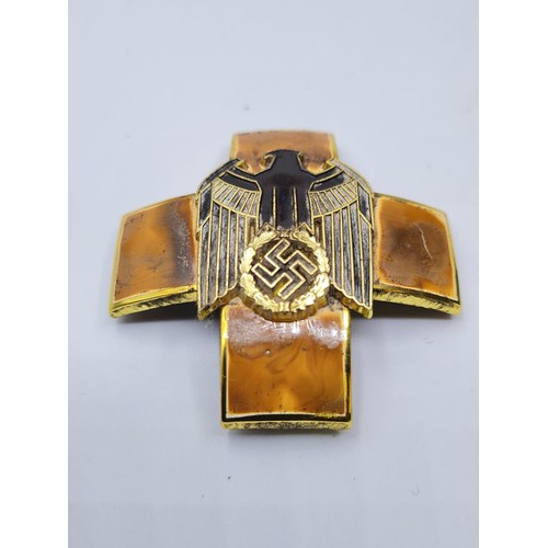 118 - WW2 German Welfare Cross 1st Class. Looks as it has been in a fire