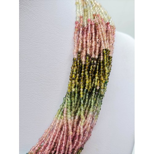 226 - Tourmaline multi coloured necklace with 18ct white gold clasp, weight 77.2g and length 76cms