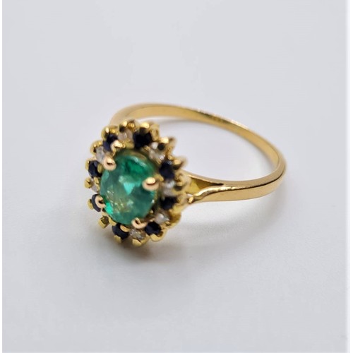 37 - 18ct gold emerald, diamond and sapphire ring. weight 3.3g & size M