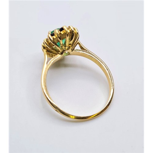 37 - 18ct gold emerald, diamond and sapphire ring. weight 3.3g & size M