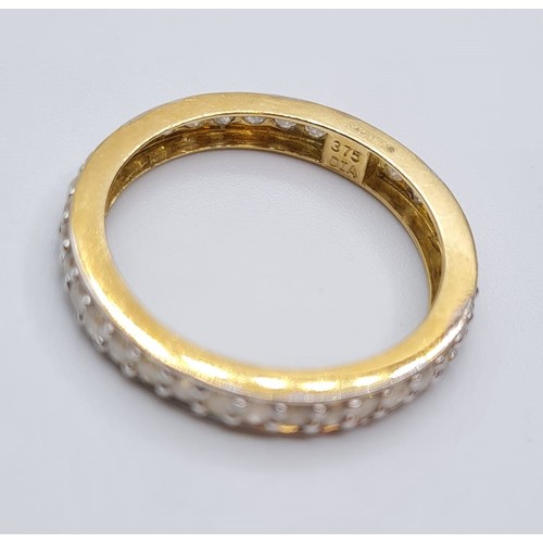 341 - 9ct gold full eternity ring with over 1ct of diamonds.