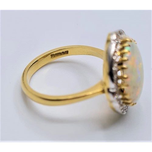 144 - Opel and diamond ring set in 18ct gold, weight 5.7g & Size M