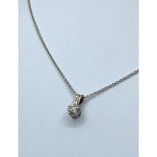 195 - 0.33ct diamond pendant set in 18ct white gold with a 18cm gold necklace, weight 2.28g