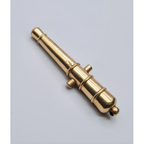 82 - 9ct gold miniature cannon lighter, weight 7.2g and length 5cms