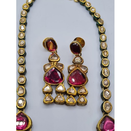 3 - An antique handmade and decorated ruby and diamond necklace with matching earrings with beautifully ... 