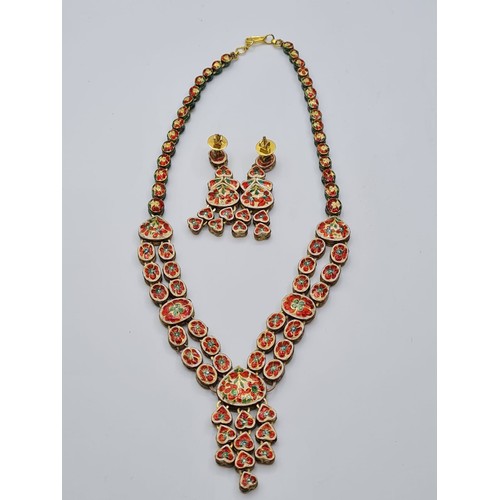 3 - An antique handmade and decorated ruby and diamond necklace with matching earrings with beautifully ... 