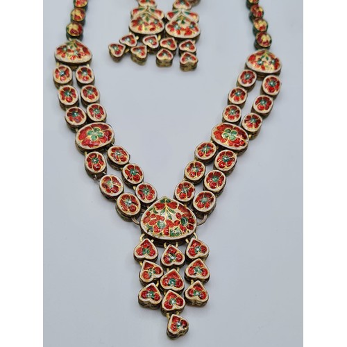 3 - An antique handmade and decorated ruby and diamond necklace with matching earrings with beautifully ... 