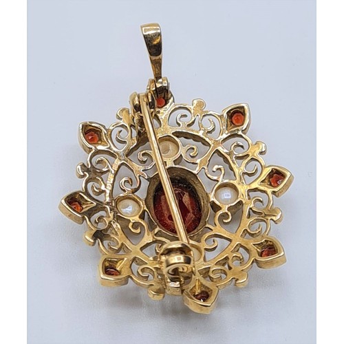 71 - Victorian  9ct gold pendant with seed pearls and garnets. weight 4.8g and length 3cms