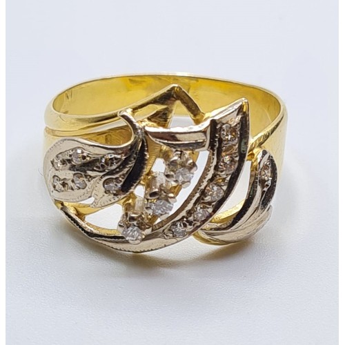 57 - 18ct gold ring with inset diamonds and diamond trilogy centre. weight 5.4g and size S