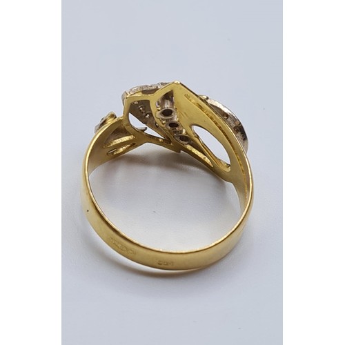 57 - 18ct gold ring with inset diamonds and diamond trilogy centre. weight 5.4g and size S