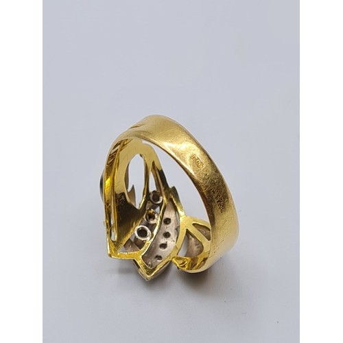 57 - 18ct gold ring with inset diamonds and diamond trilogy centre. weight 5.4g and size S