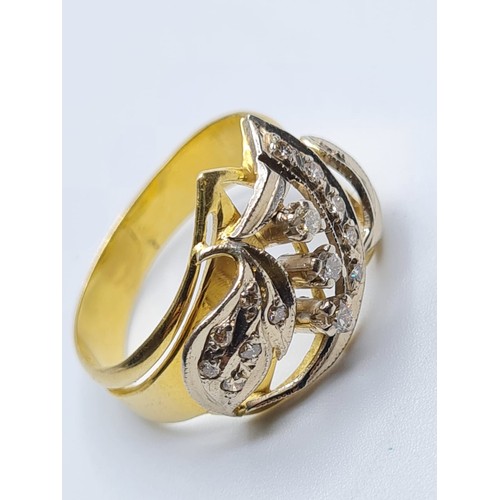 57 - 18ct gold ring with inset diamonds and diamond trilogy centre. weight 5.4g and size S