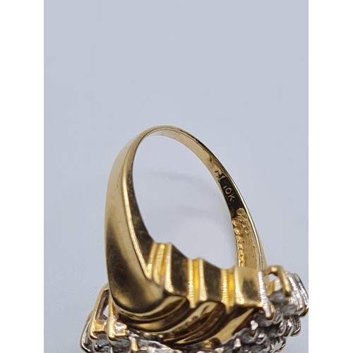 385 - A 10ct gold dress ring with diamonds, weight 6.8g & size Q