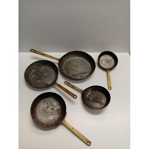 536 - Pair of Brass Candlesticks and Set of 5 Brass and Copper Vintage Skillets