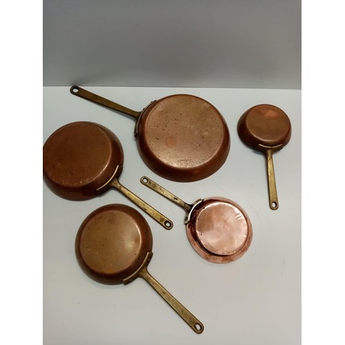 536 - Pair of Brass Candlesticks and Set of 5 Brass and Copper Vintage Skillets