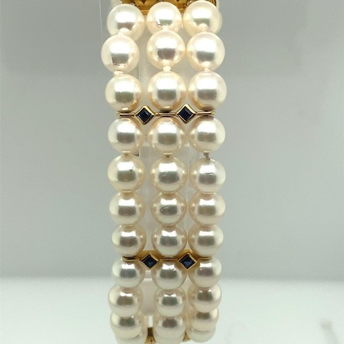 292 - 9CT Yellow gold 3 ROW CULTURED PEARL AND SAPPHIRE BRACELET 8