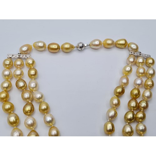 345 - 3 rows of south sea natural pearls  with diamond and 18ct gold clasp. Weight 150g