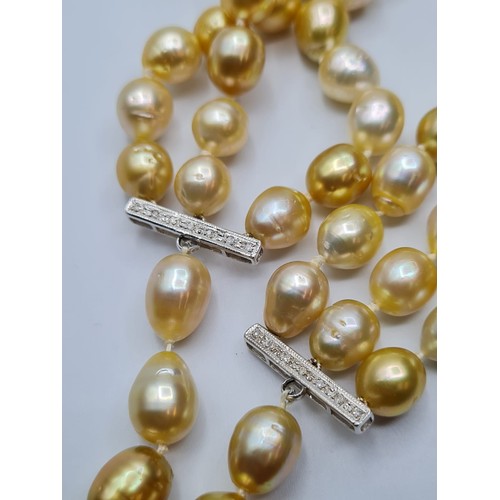 345 - 3 rows of south sea natural pearls  with diamond and 18ct gold clasp. Weight 150g