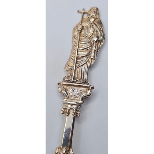 135 - A 1901 Hallmarked Ornate Cathedral Spoon 44.8g, 18cms.