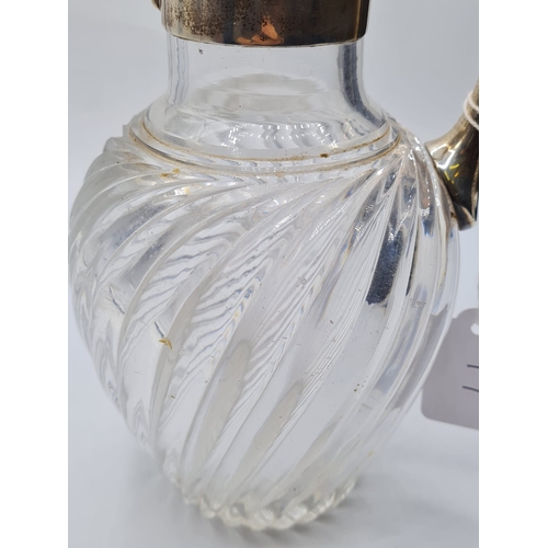 17 - Victorian Grecian Style Cut Glass Jug with Hallmarked Silver Collar and Spouted Lid, 1.05k, 20.5cm T... 