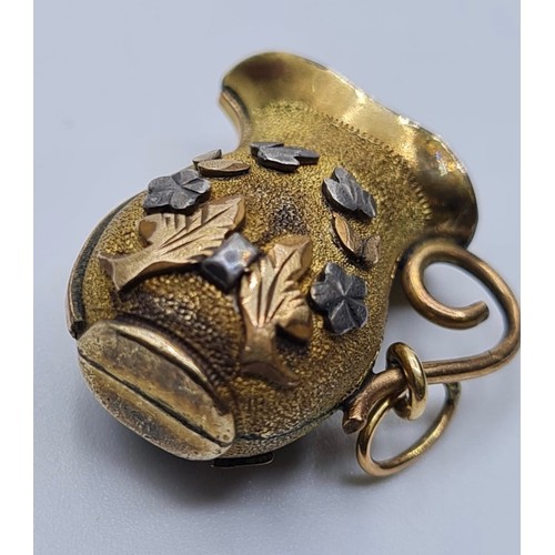 347 - Antique 18ct gold jug charm, weight 3.9g and length 2cms