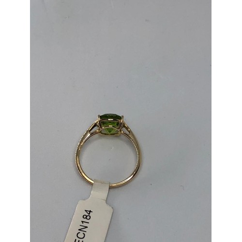 304 - 10K yellow gold ring with 3.23ct peridot, weight 2.2g and size P1/2 (ECN184)