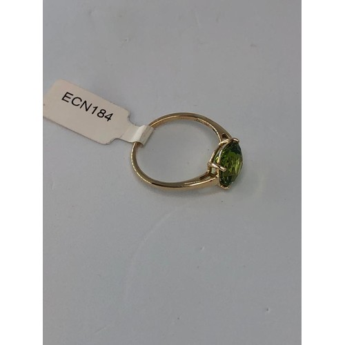 304 - 10K yellow gold ring with 3.23ct peridot, weight 2.2g and size P1/2 (ECN184)