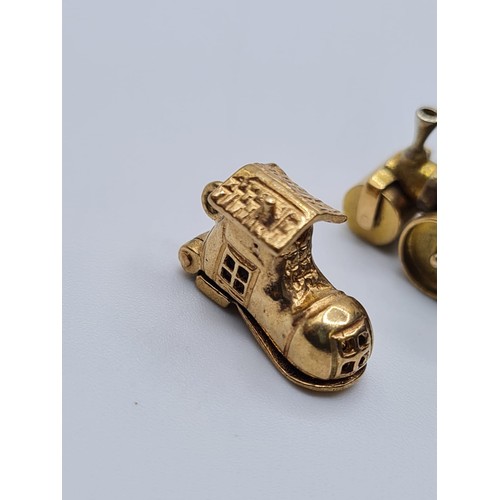 344 - 2 9ct gold charms, 1 steam roller and 1 boot, weight 5.4g