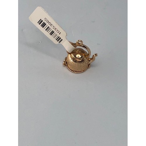 308 - 9k yellow gold kettle charm with surprise, weight 3.8g (ecn280)