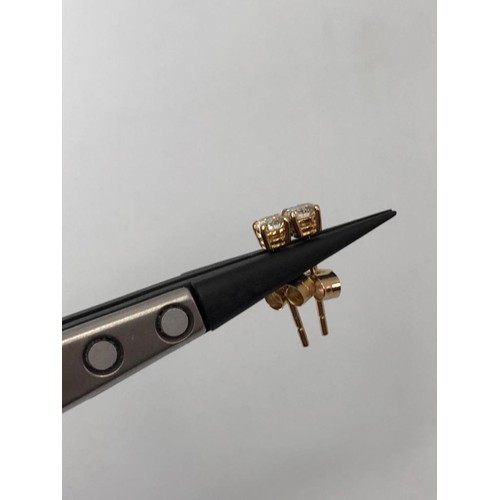 402 - 9K yellow gold studs earring with 0.50ct diamonds total approx (ecn182)