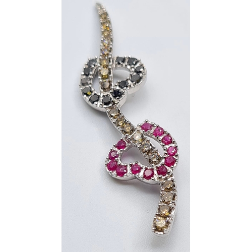 505 - 18ct white gold double heart pendant with diamonds and ruby's, weight 5.4g & length 5cms