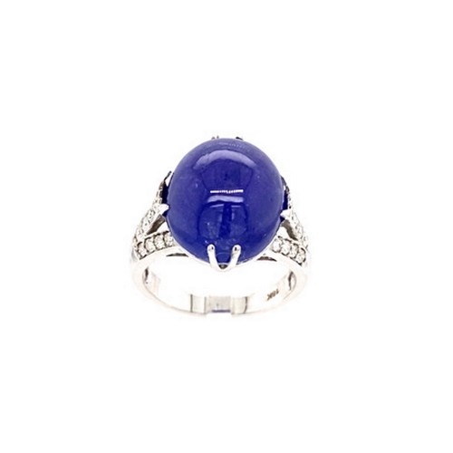 313 - 18k white gold ring with 9.11ct oval cabochon tanzanite stone and 3 rows of 0.42ct diamonds (G/I, SI... 