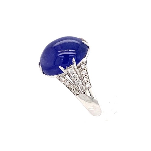 313 - 18k white gold ring with 9.11ct oval cabochon tanzanite stone and 3 rows of 0.42ct diamonds (G/I, SI... 