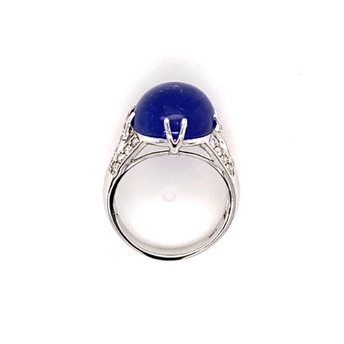 313 - 18k white gold ring with 9.11ct oval cabochon tanzanite stone and 3 rows of 0.42ct diamonds (G/I, SI... 