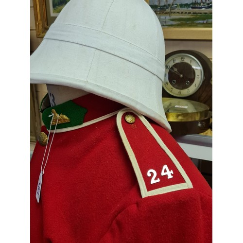 184 - A Repro Zulu Wars Tunic & Helmet as Worn at Rorkes Drift.