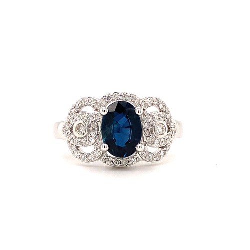 307 - 18k white gold crown designed ring with 1.20ct oval natural blue sapphire (Madagascar) and 0.30ct di... 