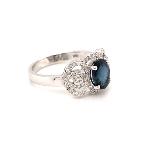 307 - 18k white gold crown designed ring with 1.20ct oval natural blue sapphire (Madagascar) and 0.30ct di... 