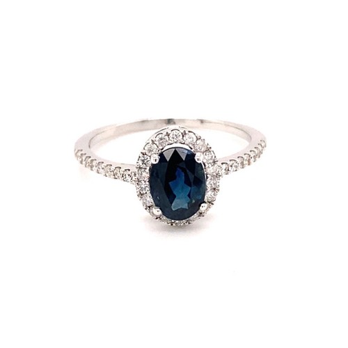 301 - 18k white gold ring with 1.20ct oval natural blue sapphire (Madagascar)  halo and 0.35ct diamonds (G... 