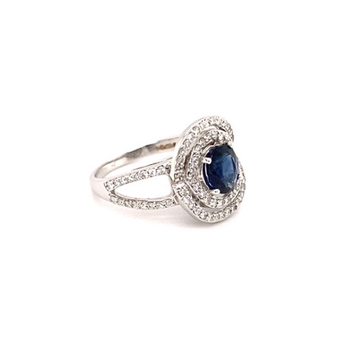 295 - 18k white gold halo ring with 1.15ct oval natural dark blue sapphire (Madagascar) double halo and 0.... 