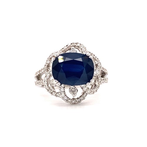 288 - 18k white gold ring with 3.25ct oval natural blue sapphire flower design halo and 2 rows of 0.69ct d... 