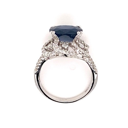 288 - 18k white gold ring with 3.25ct oval natural blue sapphire flower design halo and 2 rows of 0.69ct d... 