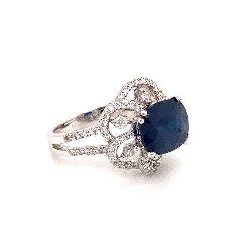 288 - 18k white gold ring with 3.25ct oval natural blue sapphire flower design halo and 2 rows of 0.69ct d... 