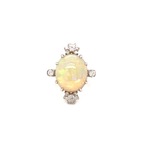 276 - 18K white gold ring with 6ct oval opal cabochon centre and 0.36ct diamonds (G/I, SI), weight 6.47g a... 