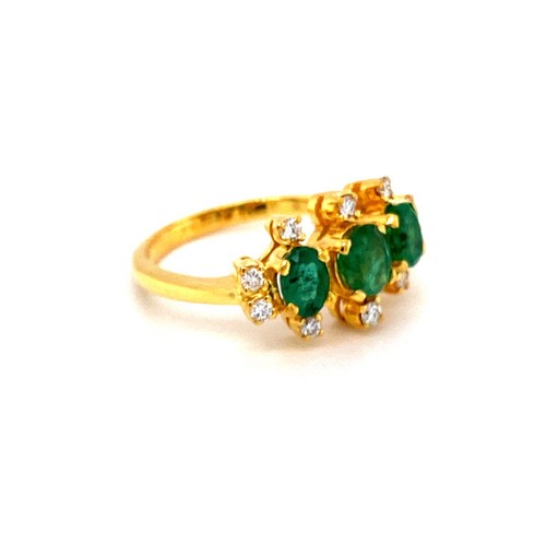 261 - 21k yellow gold emerald and diamond ring with trilogy green emeralds (oval natural, 1.5ct SI approx)... 