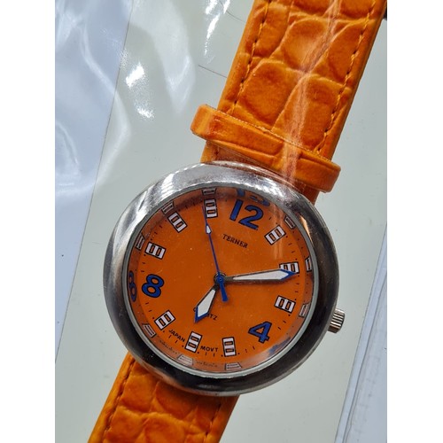 602 - 2x Ladies Fashion Watches Unused and in Original Packaging with Tags. 1x Orange Face and Strap, 1x S... 