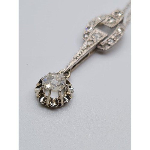 611 - 9ct white gold diamond pendant with 0.25ct diamond and diamond encrusting, weight 2.1g and 42cm long