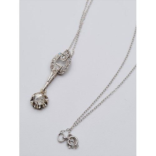 611 - 9ct white gold diamond pendant with 0.25ct diamond and diamond encrusting, weight 2.1g and 42cm long