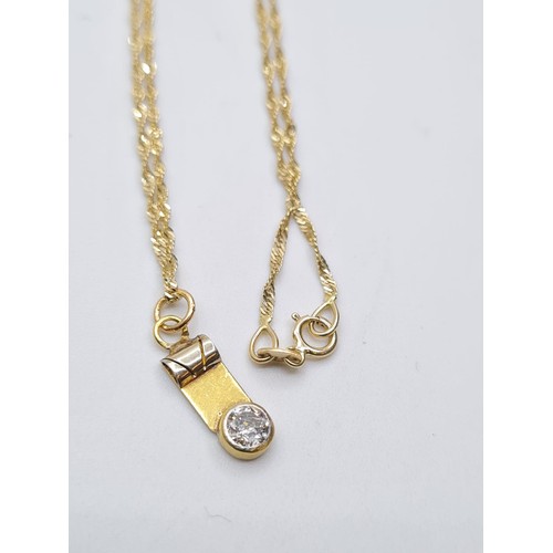 607 - A 14ct gold pendant with a 0.25ct diamond solitaire on a 44cm chain, weight 2g