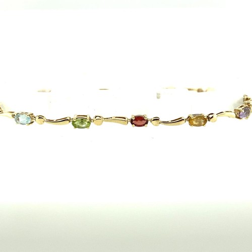 620 - 9ct y/g stone set bracelet 4.5G set with amethyst, citrine, garnet, peridot and Blue topaz